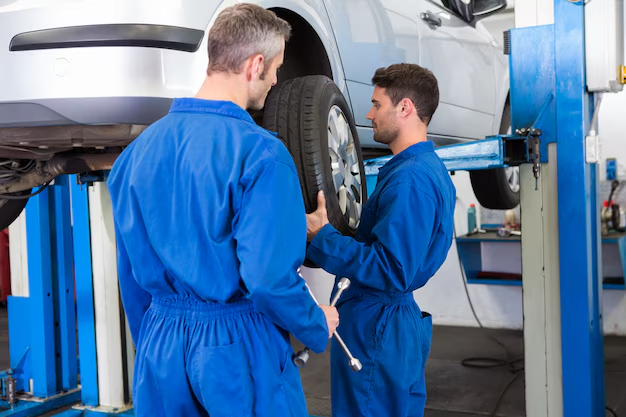 Empowered teams operate like a finely tuned pit crew — each expert trusted to do their part.